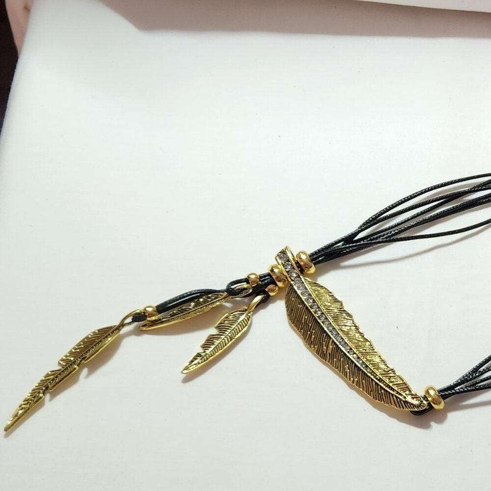 THREE FOR $20 Fun feather costume necklace gold black NIB